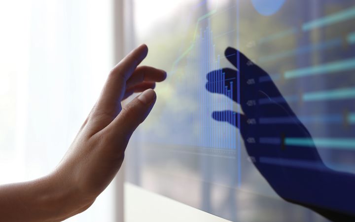 hand touching screen